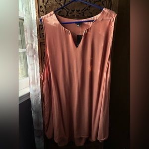 Beautiful torrid coral color blouse in size 5, brand new with tags.